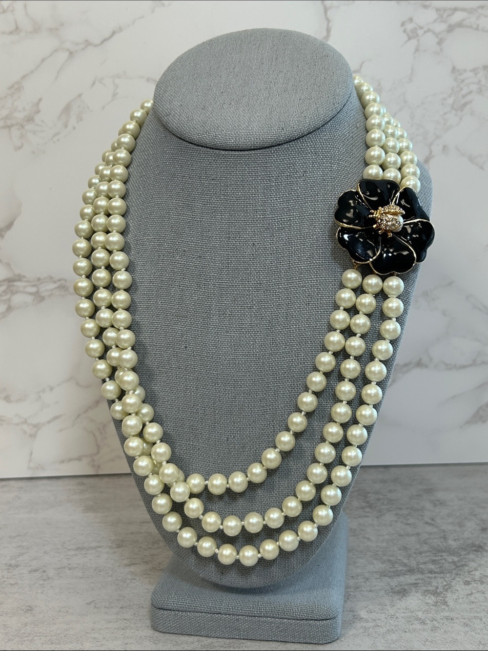 Classic Triple-Strand Glass Pearl Necklace with Black Flower and Ladybug